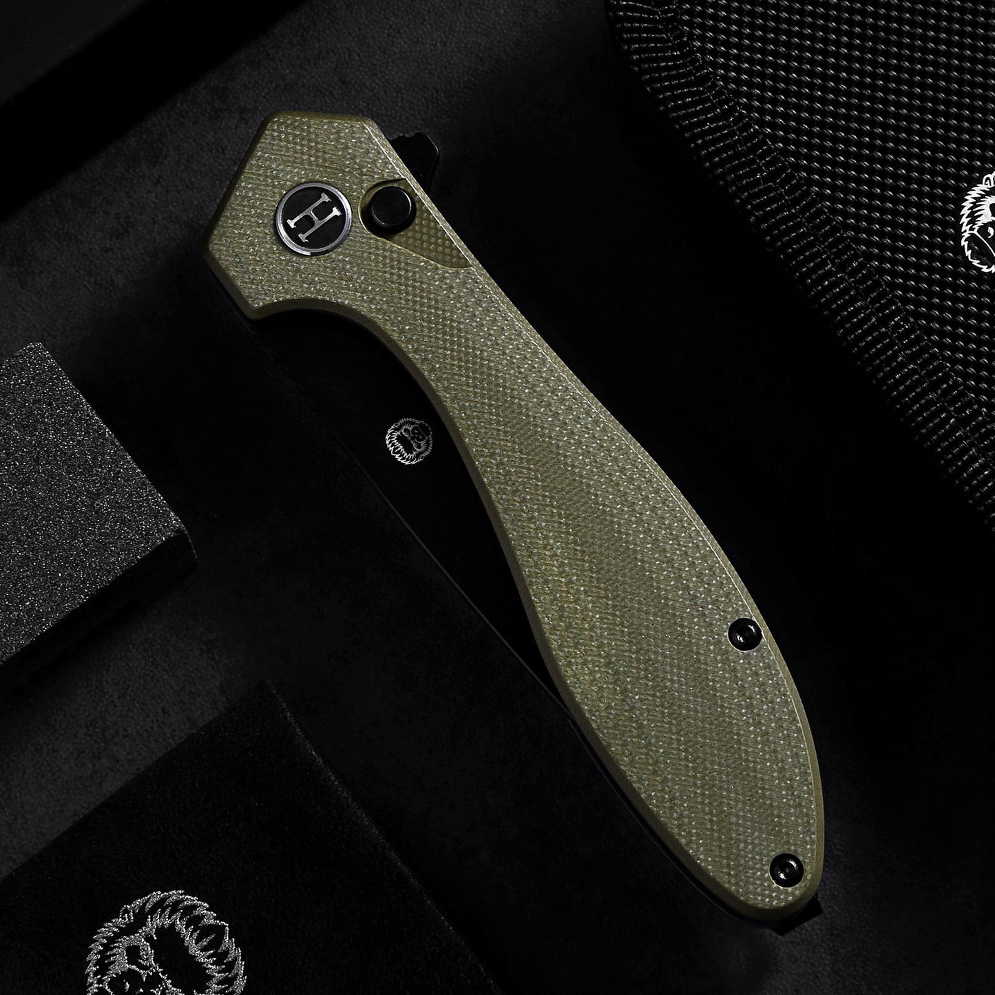 The Vector Button Lock Folding Pocket Knife