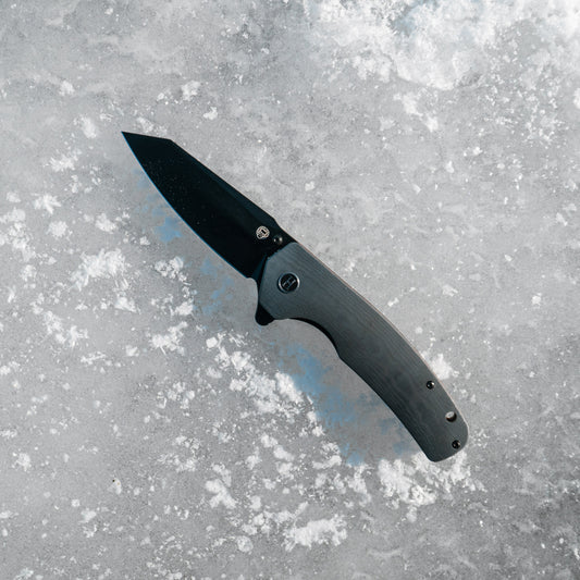 The Clip Point Folding Pocket Knife (Black and Orange)