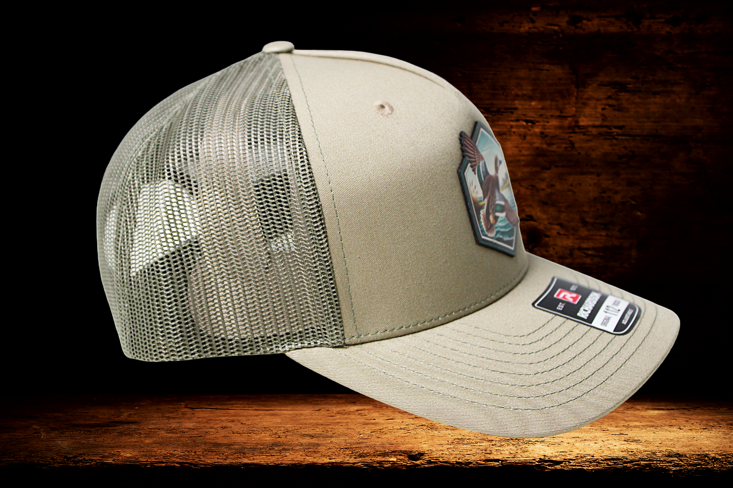 Flying duck portrait on khaki hat